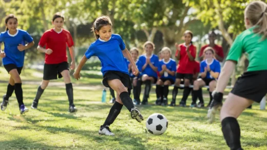 MLS GO Partnership youth soccer clinic with children practicing on a school field